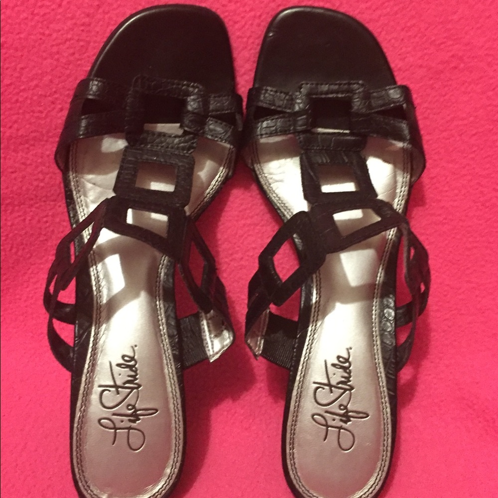 Black leather-like sandals. 2” heels